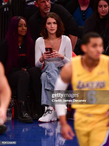 Bella Hadid is seen watching Jordan Clarkson during the New York Knicks Vs Los Angeles Lakers game at Madison Square Garden on December 12, 2017 in...