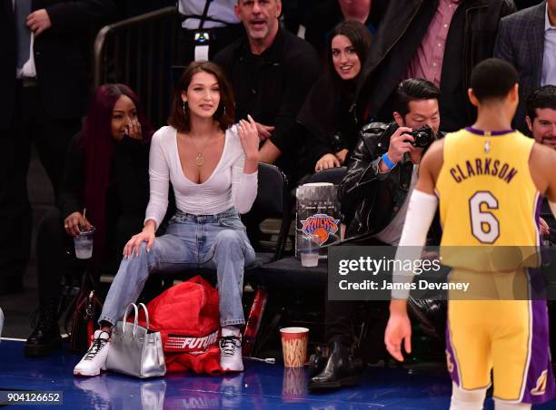 Bella Hadid is seen watching Jordan Clarkson during the New York Knicks Vs Los Angeles Lakers game at Madison Square Garden on December 12, 2017 in...