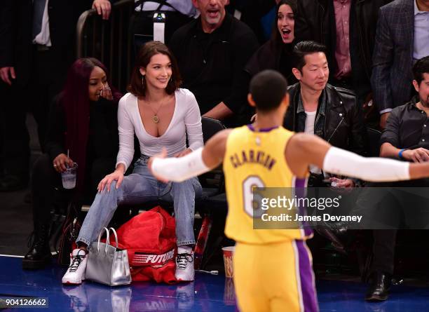 Bella Hadid is seen watching Jordan Clarkson during the New York Knicks Vs Los Angeles Lakers game at Madison Square Garden on December 12, 2017 in...