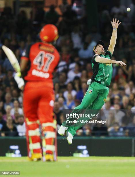 Dwayne Bravo of the Renegades hits the ball over John Hastings of the Stars during the Big Bash League match between the Melbourne Renegades and the...