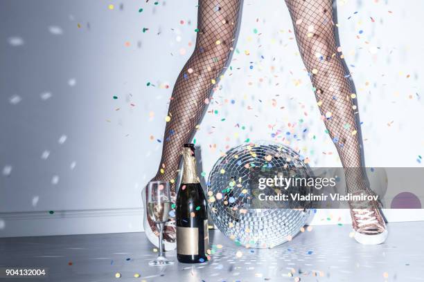 party details of female legs and disco ball - legs show stock pictures, royalty-free photos & images