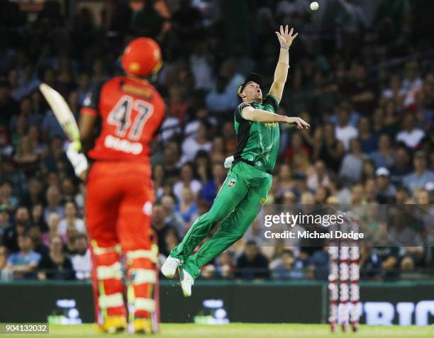 Dwayne Bravo of the Renegades hits the ball over John Hastings of the Stars during the Big Bash League match between the Melbourne Renegades and the...