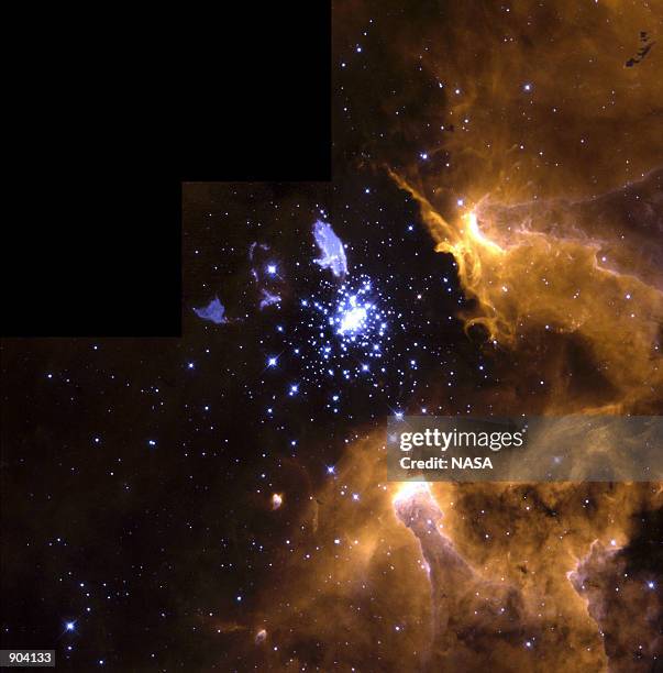 In this stunning picture of the giant galactic nebula NGC 3603, the crisp resolution of the Hubble Space Telescope captures various stages of the...