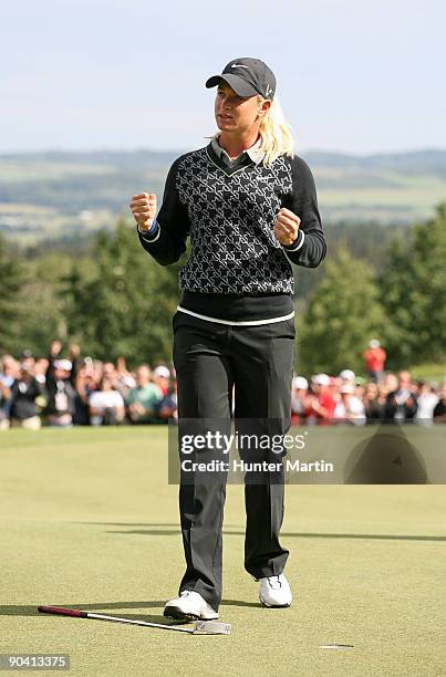 Suzann Pettersen of Norway reacts on the 18th green after winning the Canadian Women's Open at Priddis Greens Golf & Country Club on September 6,...