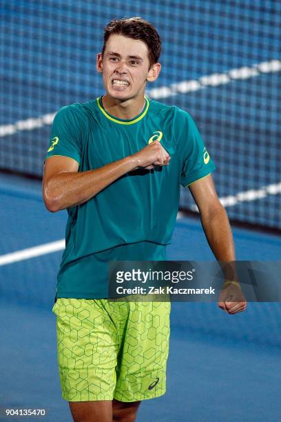 Alex de Minaur of Australia reacts after defeating Benoit Paire of France in the Men's semi final during day six of the 2018 Sydney International at...