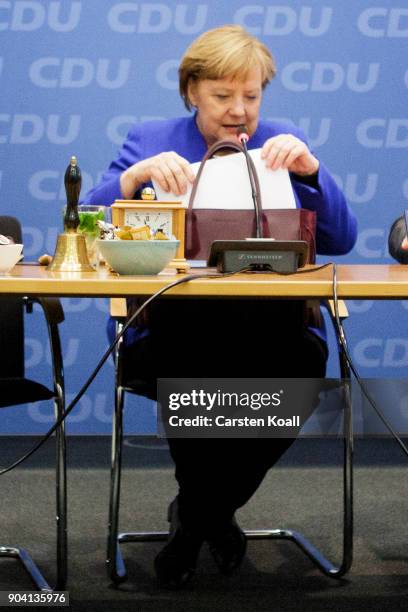 German Chancellor and leader of the German Christian Democrats Angela Merkel attends a meeting of the CDU leadership following all night talks with...