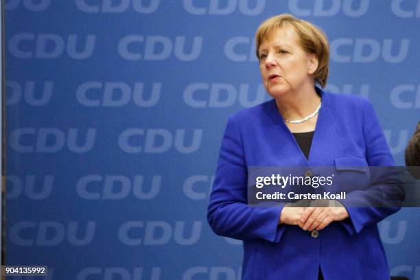 German Chancellor and leader of the German Christian Democrats Angela Merkel attends a meeting of the CDU leadership following all night talks with...