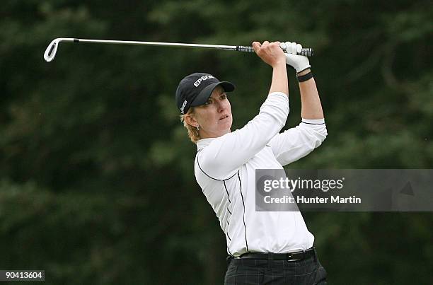 Karrie Webb of Australia hits her second shot on the seventh hole during the final round of the Canadian Women's Open at Priddis Greens Golf &...