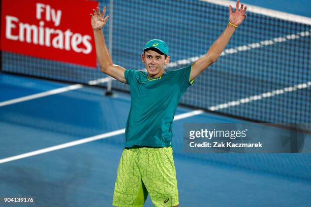 Alex de Minaur of Australia reacts after defeating Benoit Paire of France in the Men's semi final during day six of the 2018 Sydney International at...