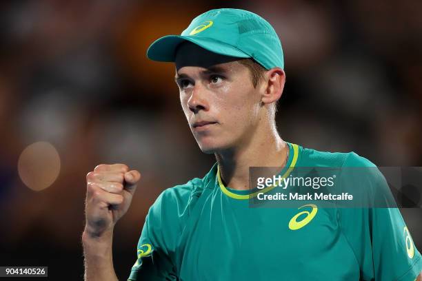 Alex de Minaur of Australia celebrates winning a point in his semi final match against Benoit Paire of France during day six of the 2018 Sydney...