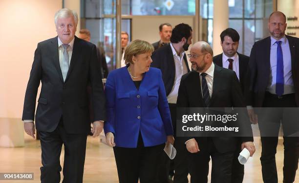 Horst Seehofer, leader of the Christian Social Union party, left, and Angela Merkel, Germany's chancellor, center, and Martin Schulz, leader of the...