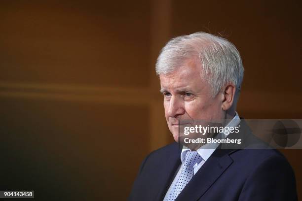 Horst Seehofer, leader of the Christian Social Union party, looks on during a news conference following overnight coalition negotiations, at the...