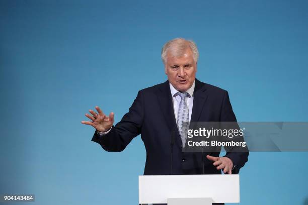Horst Seehofer, leader of the Christian Social Union party, gestures as he speaks during a news conference following overnight coalition...