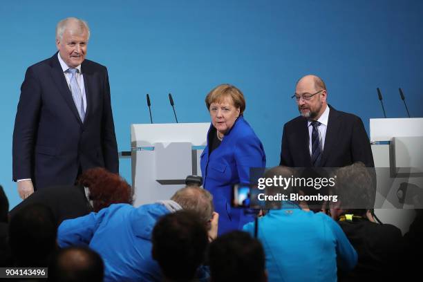 Horst Seehofer, leader of the Christian Social Union party, left, Angela Merkel, Germany's chancellor, center, and Martin Schulz, leader of the...