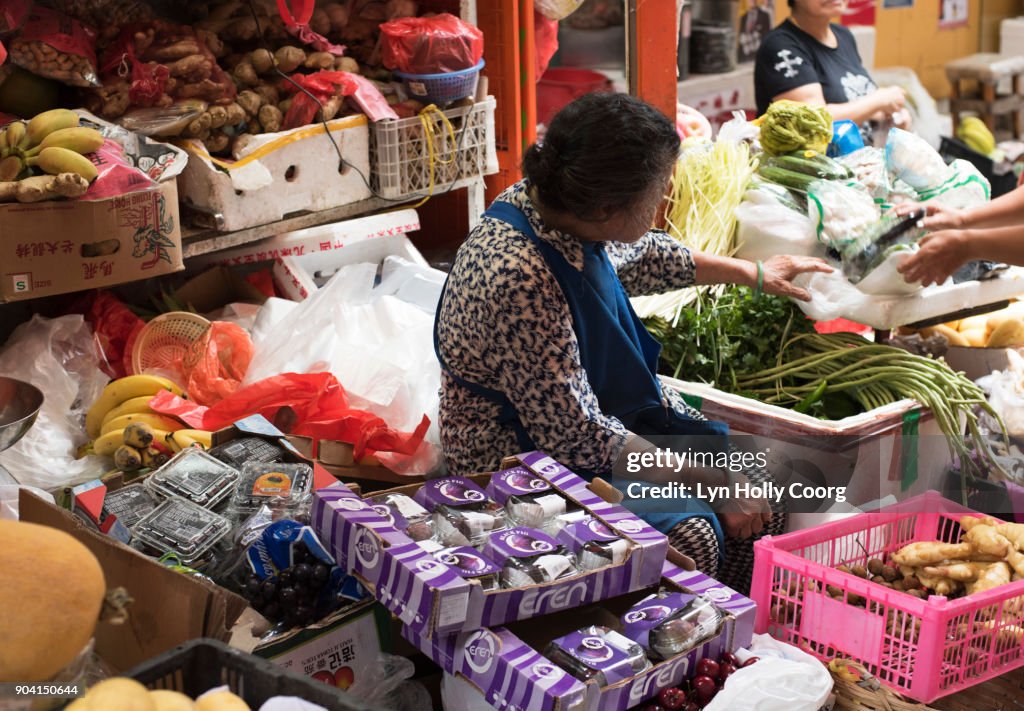 Vendor in Hong Kong market