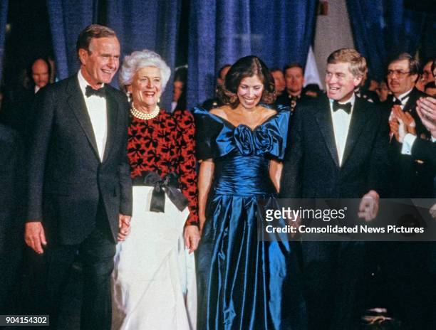 From left, US President-Elect George HW Bush, Barbara Bush, Marilyn Quayle, and Vice President-Elect Dan Quayle attend the Black Tie and Boots...