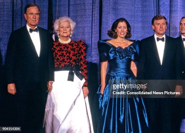 From left, US President-Elect George HW Bush, Barbara Bush, Marilyn Quayle, and Vice President-Elect Dan Quayle attend the Black Tie and Boots...