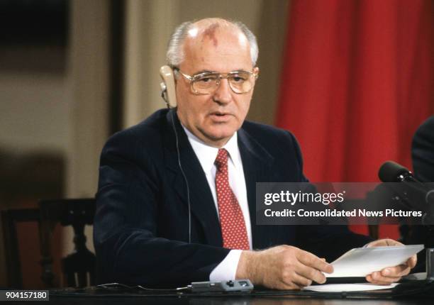 Soviet President Mikhail Gorbachev speaks during a press conference in the White House's East Room, Washington DC, June 3, 1990. Seated beside him,...