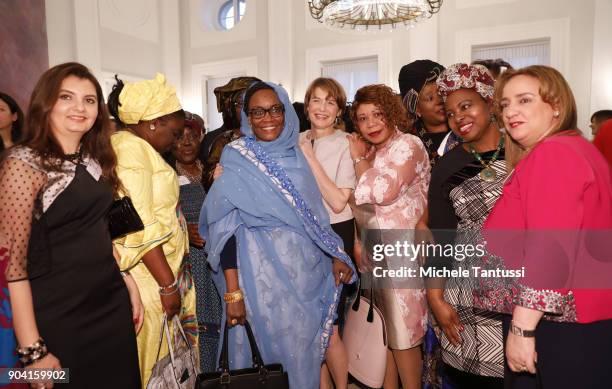 German First Lady Elke Buedenbender, center, poses with Ambassadors wives during the first Reception For Diplomatic Corp Wives in the Bellevue palace...