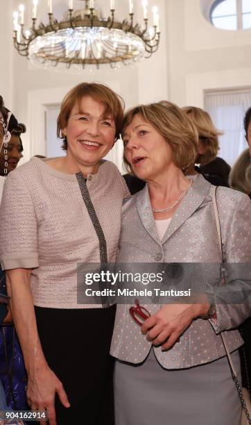 German First Lady Elke Buedenbender, center left poses with former German First Lady Daniela Schadt, center right, together with Ambassadors wives...