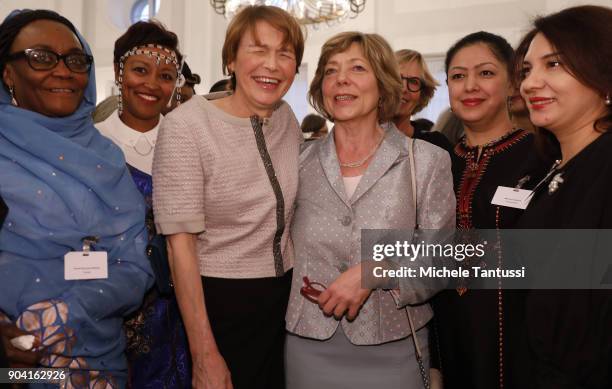 German First Lady Elke Buedenbender, center left poses with former German First Lady Daniela Schadt, center right, together with Ambassadors wives...