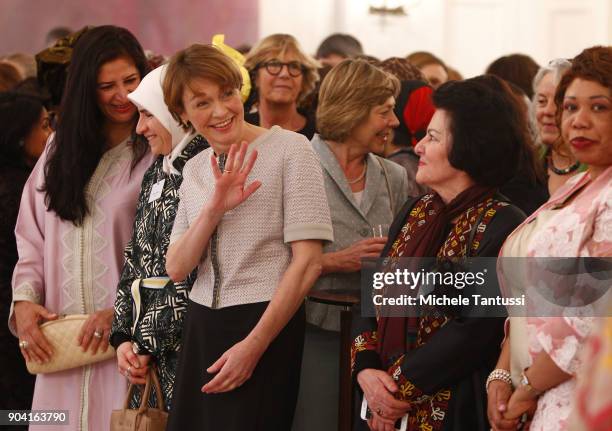 German First Lady Elke Buedenbender, center, listens with Ambassadors wives during the first Reception For Diplomatic Corp Wives in the Bellevue...