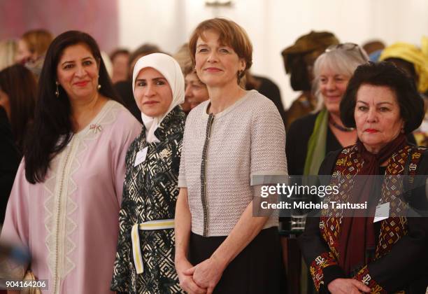 German First Lady Elke Buedenbender, center, listens with Ambassadors wives during the first Reception For Diplomatic Corp Wives in the Bellevue...