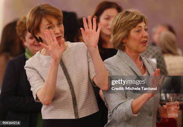 German First Lady Elke Buedenbender, left, reacts with former German First Lady Daniela Schadt, during the first Reception For Diplomatic Corp Wives...