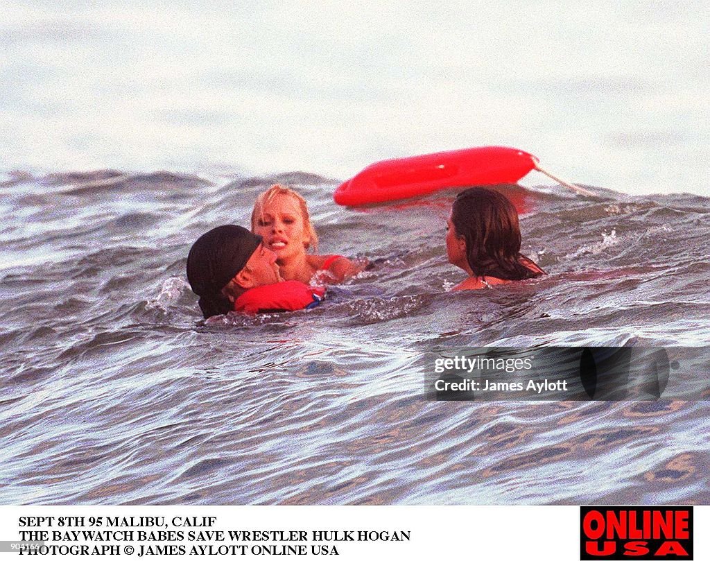 SEPT 8TH 85 MALIBU, CALIF BAYWATCH FILMING THE BAY WATCH BABES SAVE WRESTLER HULK HOGAN FROM DROWNIN