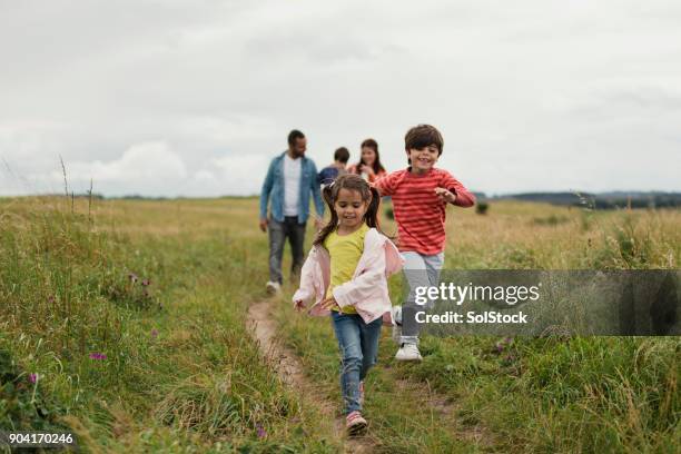 three generation out walking - three generations hiking stock pictures, royalty-free photos & images