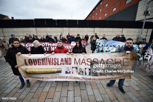 Loughinisland victim protestors stand alongside Ballymurphy victim supporters at Belfast High Court on January 12, 2018 in Belfast, Northern Ireland....