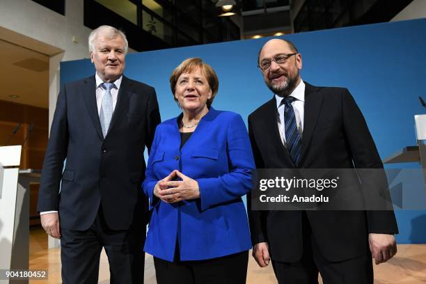 German Chancellor Angela Merkel , Bavarian Prime Minister Horst Seehofer and Social Democratic Party, SPD chairman Martin Schulz pose for a photo...