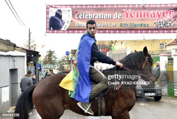 Algerian Berbers celebrate the Yennayer New Year in Ath Mendes, south of Tizi-Ouzou, east of the capital Algiers, on January 12, 2018. The Berbers --...