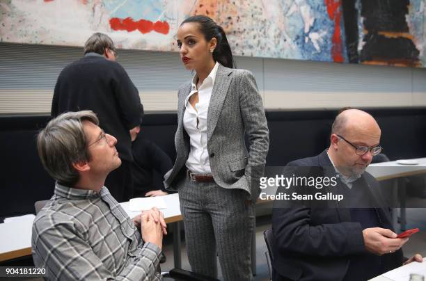 Berlin politician and member of the German Social Democrats Sawsan Chebli chats with colleagues as she attends a meeting of the SPD Bundestag faction...
