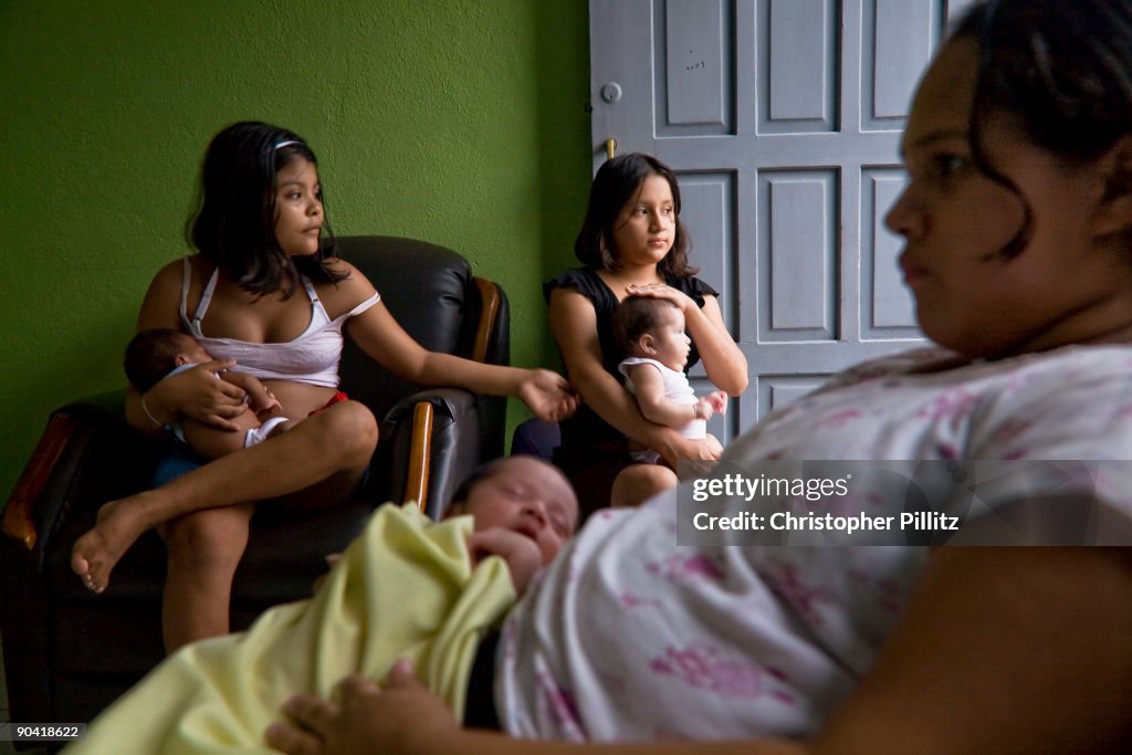 Young child mothers looking after their babies