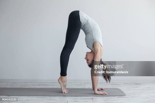 ready for handstand pose - bent stock pictures, royalty-free photos & images