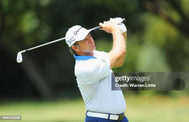 Retief Goosen of South Africa plays his second shot on the 7th hole during day two of the BMW South African Open Championship at Glendower Golf Club...