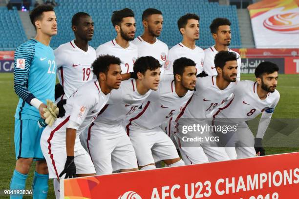 Players of Qatar line up prior to the AFC U-23 Championship Group A match between Oman and Qatar at Changzhou Olympic Sports Center on January 12,...