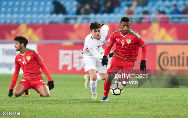 Al Mandhar Al Alawi of Oman controls the ball during the AFC U-23 Championship Group A match between Oman and Qatar at Changzhou Olympic Sports...