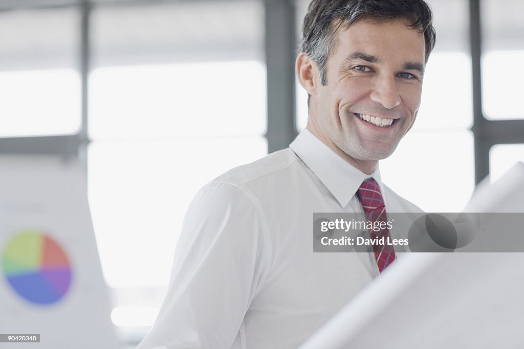 Portrait of businessman, close up, smiling