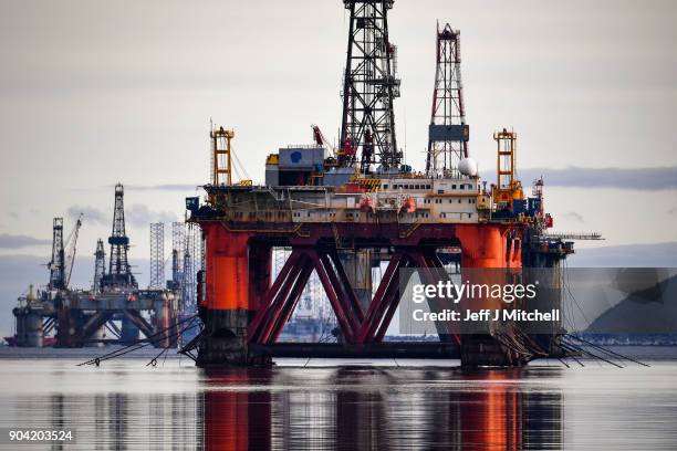 Oil rigs weighing thousands of tons are continuing to be stacked up in the Cromarty Firth on January 12, 2018 in Invergordon, Scotland. Rig platforms...