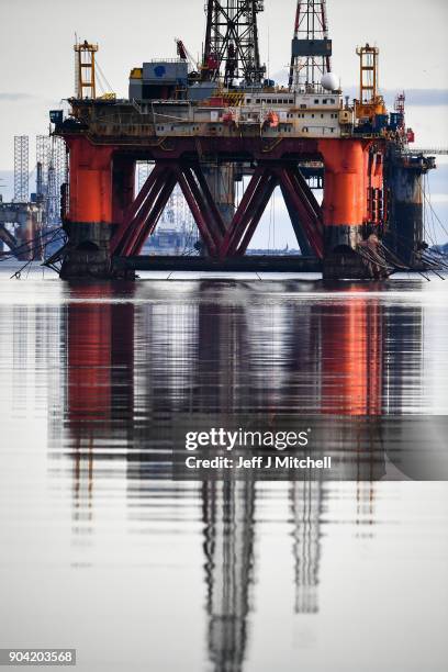 Oil rigs weighing thousands of tons are continuing to be stacked up in the Cromarty Firth on January 12, 2018 in Invergordon, Scotland. Rig platforms...