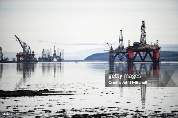 Oil rigs weighing thousands of tons are continuing to be stacked up in the Cromarty Firth on January 12, 2018 in Invergordon, Scotland. Rig platforms...