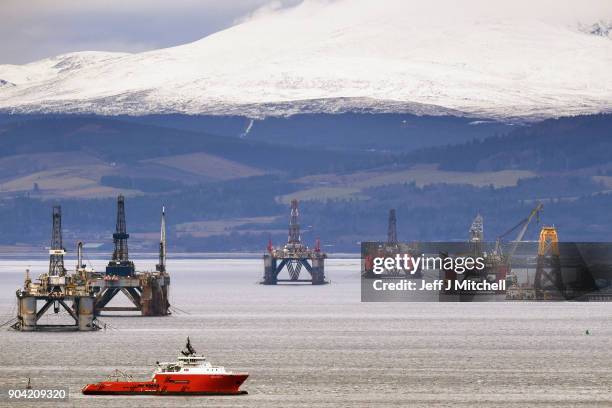 Oil rigs weighing thousands of tons are continuing to be stacked up in the Cromarty Firth on January 12, 2018 in Invergordon, Scotland. Rig platforms...