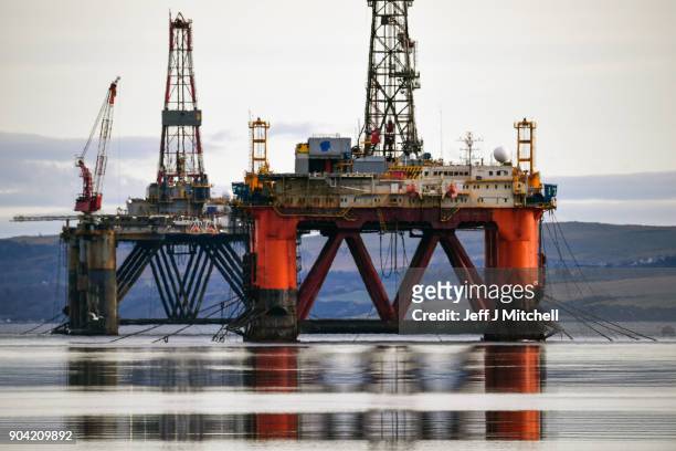 Oil rigs weighing thousands of tons are continuing to be stacked up in the Cromarty Firth on January 12, 2018 in Invergordon, Scotland. Rig platforms...