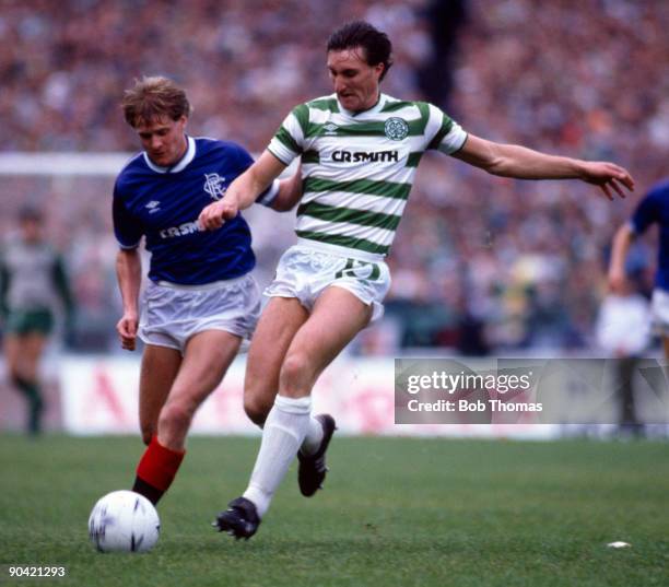 Allan McInally of Celtic with Stuart Munro of Rangers during the Celtic v Rangers Scottish Premier League match played at Parkhead in Glasgow on the...