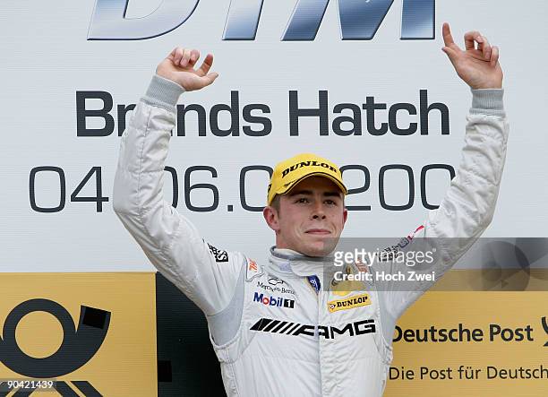 Paul Di Resta of Great Britain and AMG Mercedes celebrates winning the DTM 2009 German Touring Car Championship race at Brands Hatch on September 6,...