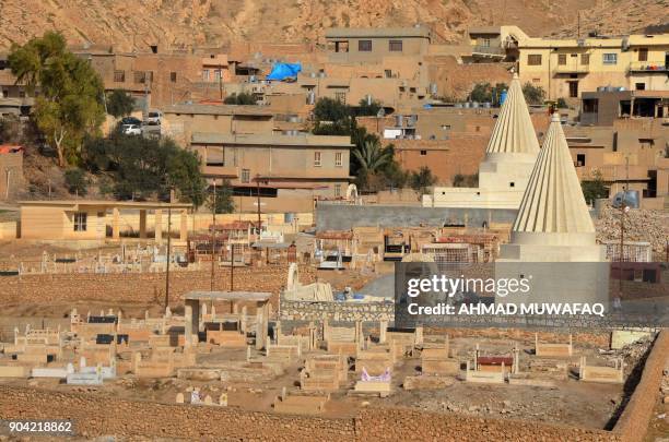 General view shows rebuilt Yazidi temples on January 12 in the town of Bashiqa, some 20 kilometres north east of Mosul. / AFP PHOTO / Ahmad MUWAFAQ