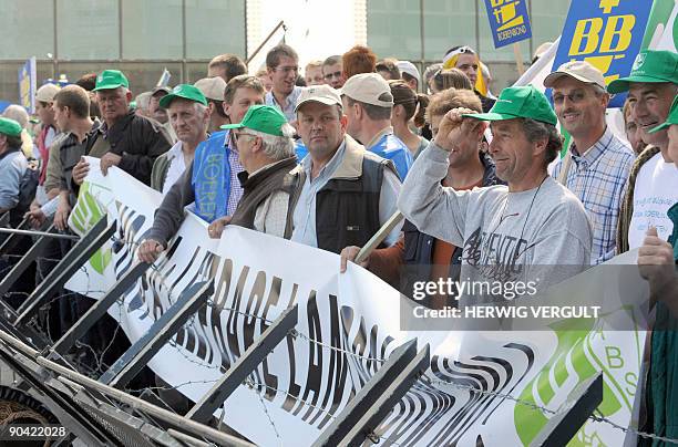 Milk farmers protest against falling milk prices outside the European agriculture council on September 7, 2009 in Brussels. EU farm ministers are to...