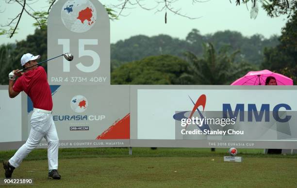 Hideto Tanihara of team Asia plays a shot during the fourballs matches on day one of the 2018 EurAsia Cup presented by DRB-HICOM at Glenmarie G&CC on...